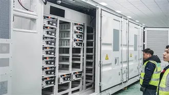 Spray painter at solar rack factory